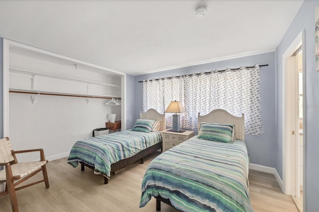500 Green Dolphin Dr S, Placida, FL 33946 - bedroom with light wood-style floors and a closet