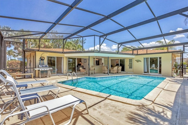 500 Green Dolphin Dr S, Placida, FL 33946 - swimming pool with a patio area, grilling area, and a lanai