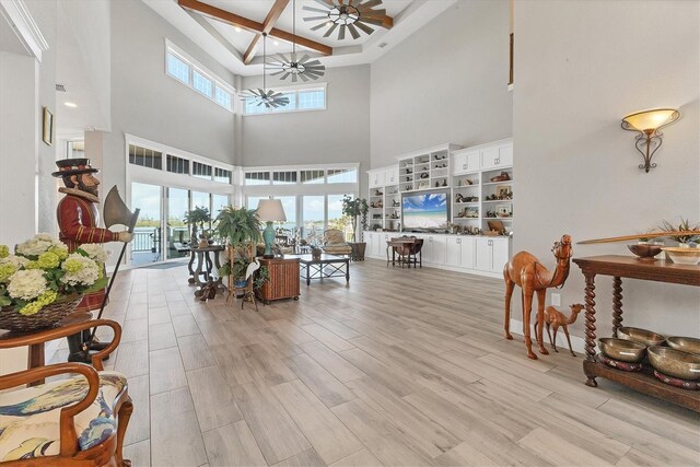 565 Green Dolphin Dr S, Placida, FL 33946 - common area featuring a high ceiling, beam ceiling, and coffered ceiling