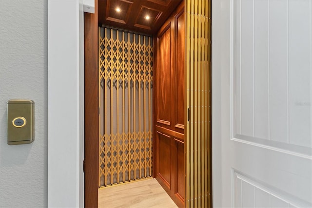 565 Green Dolphin Dr S, Placida, FL 33946 - elevator featuring wood finished floors