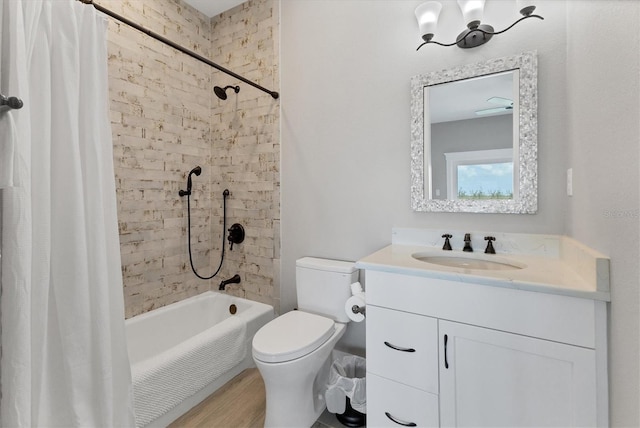 565 Green Dolphin Dr S, Placida, FL 33946 - full bathroom with vanity, toilet, shower / bath combination with curtain, and wood finished floors