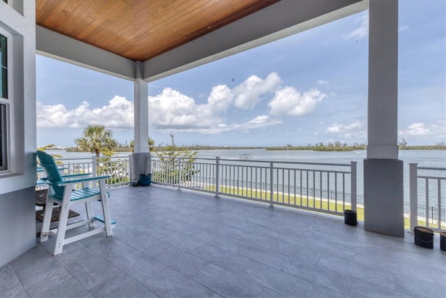565 Green Dolphin Dr S, Placida, FL 33946 - view of patio with a water view
