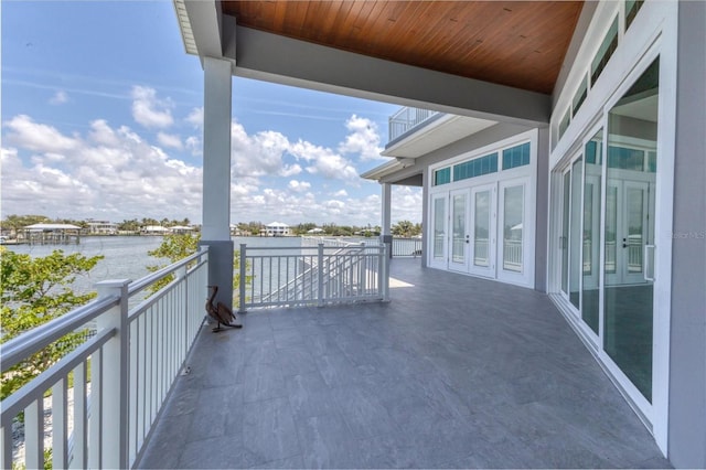 565 Green Dolphin Dr S, Placida, FL 33946 - balcony featuring a water view and french doors