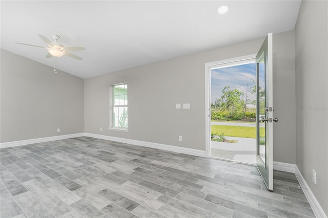 8270 Cook Ct, Port Charlotte, FL 33981 - spare room featuring a ceiling fan, baseboards, recessed lighting, and light wood-style flooring
