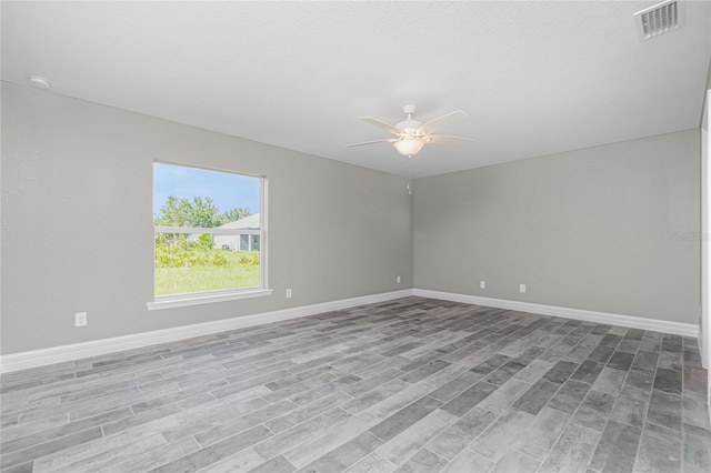8270 Cook Ct, Port Charlotte, FL 33981 - unfurnished room with ceiling fan, wood finished floors, and baseboards