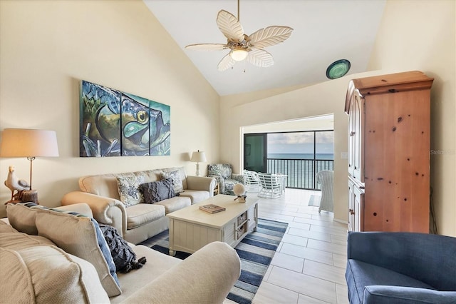 2700 N Beach Rd Unit B205, Englewood, FL 34223 - living area featuring high vaulted ceiling, ceiling fan, and light tile patterned floors