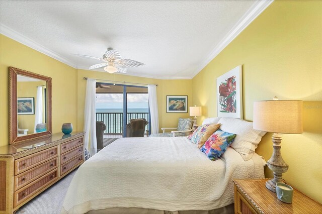 2700 N Beach Rd Unit B205, Englewood, FL 34223 - carpeted bedroom with access to exterior, ornamental molding, ceiling fan, a textured ceiling, and a water view