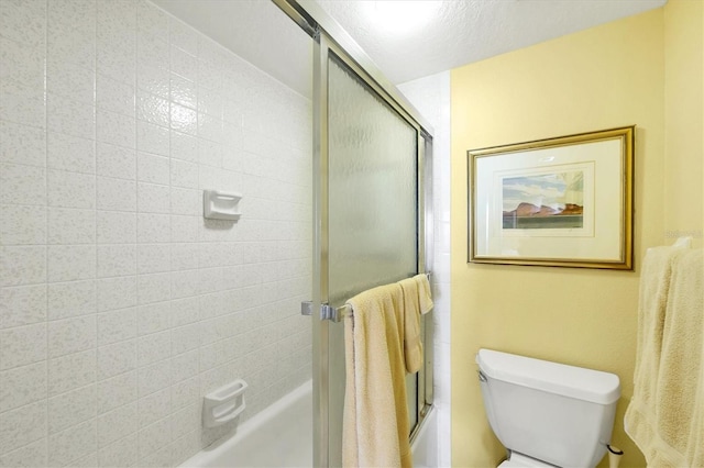 2700 N Beach Rd Unit B205, Englewood, FL 34223 - bathroom with combined bath / shower with glass door and toilet