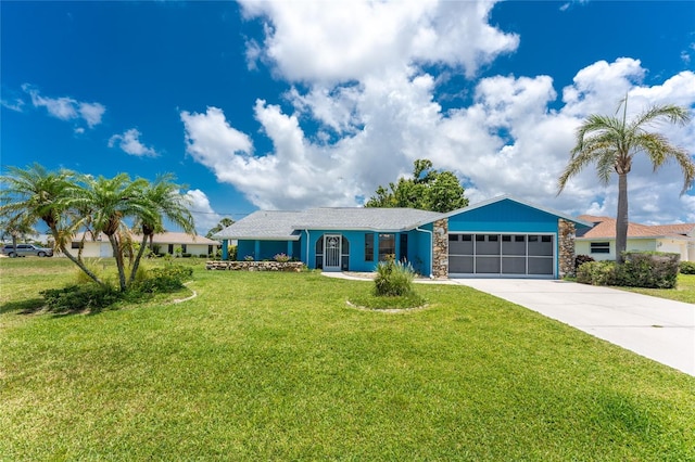 23 Bunker Cir, Rotonda West, FL 33947 - single story home with a garage, stone siding, driveway, and a front lawn