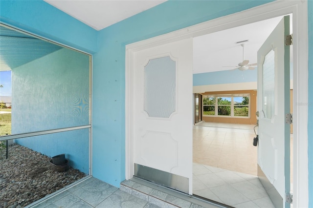 23 Bunker Cir, Rotonda West, FL 33947 - entrance to property with a ceiling fan