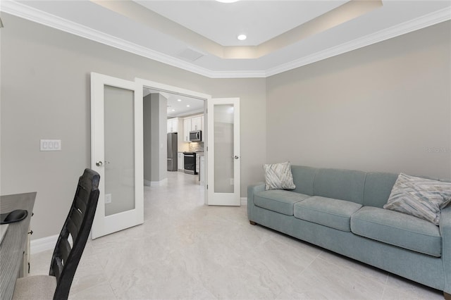 13859 Vadini St, Venice, FL 34293 - living room featuring french doors, crown molding, baseboards, a tray ceiling, and recessed lighting
