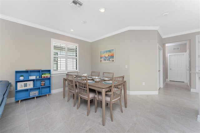 13859 Vadini St, Venice, FL 34293 - dining space with baseboards, crown molding, and light tile patterned flooring