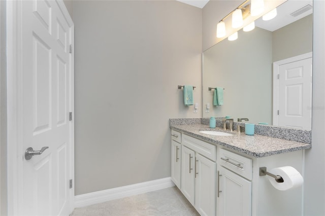 13859 Vadini St, Venice, FL 34293 - bathroom with vanity and baseboards