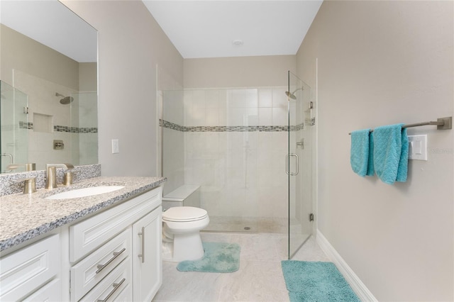13859 Vadini St, Venice, FL 34293 - bathroom with a shower stall, vanity, toilet, and tile patterned floors