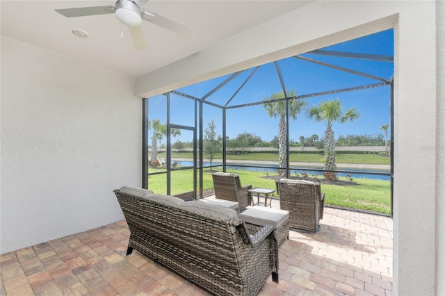 13859 Vadini St, Venice, FL 34293 - view of patio featuring a water view, ceiling fan, and glass enclosure