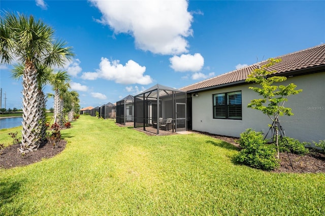13859 Vadini St, Venice, FL 34293 - view of green lawn with glass enclosure