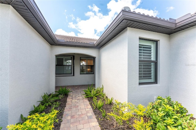 13859 Vadini St, Venice, FL 34293 - view of exterior entry with stucco siding