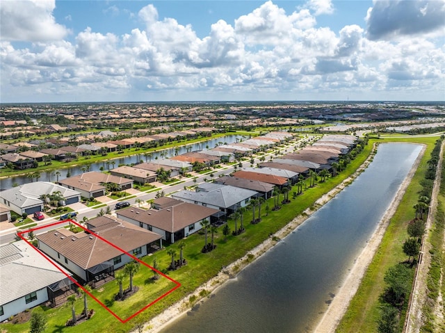 13859 Vadini St, Venice, FL 34293 - aerial perspective of suburban area with property parcel outlined and a large body of water