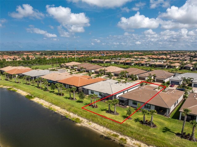 13859 Vadini St, Venice, FL 34293 - aerial view of residential area with property boundaries highlighted and a large body of water