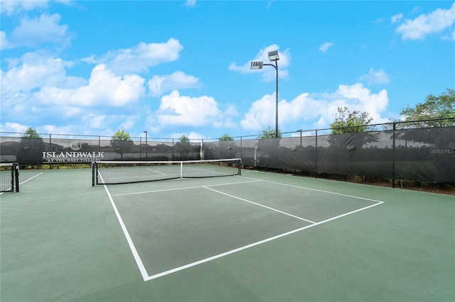 13859 Vadini St, Venice, FL 34293 - view of tennis court with community basketball court