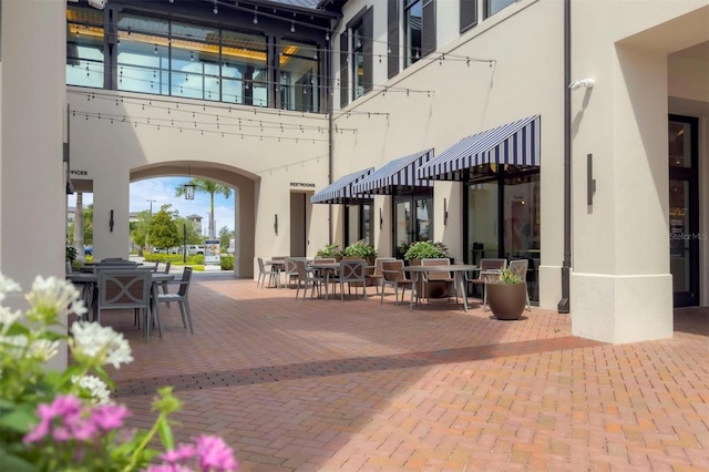 12470 Wellen Golf St Unit 108, Venice, FL 34293 - view of patio / terrace featuring outdoor dining area