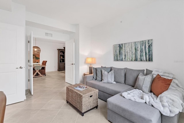 12470 Wellen Golf St Unit 108, Venice, FL 34293 - living room with light tile patterned floors