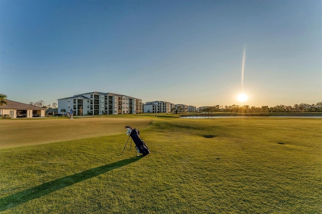 12470 Wellen Golf St Unit 108, Venice, FL 34293 - surrounding community with a yard and a water view
