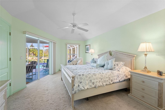 116 Tournament Rd, Rotonda West, FL 33947 - bedroom with access to outside, carpet floors, lofted ceiling, and ceiling fan
