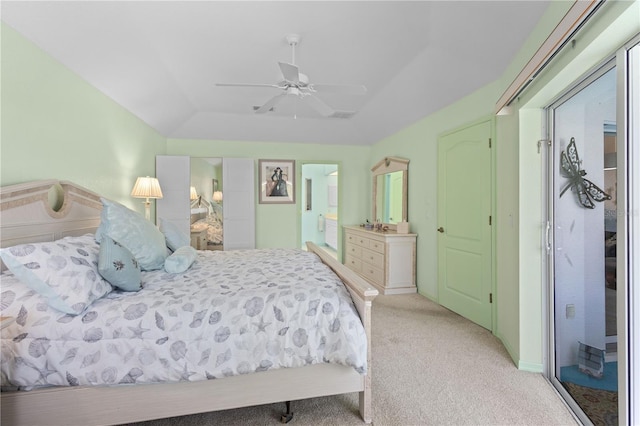 116 Tournament Rd, Rotonda West, FL 33947 - bedroom featuring carpet floors, connected bathroom, and a ceiling fan