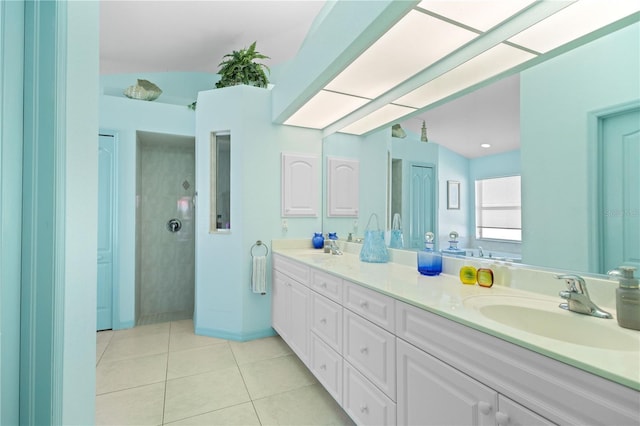 116 Tournament Rd, Rotonda West, FL 33947 - full bathroom featuring double vanity, tile patterned flooring, and a walk in shower