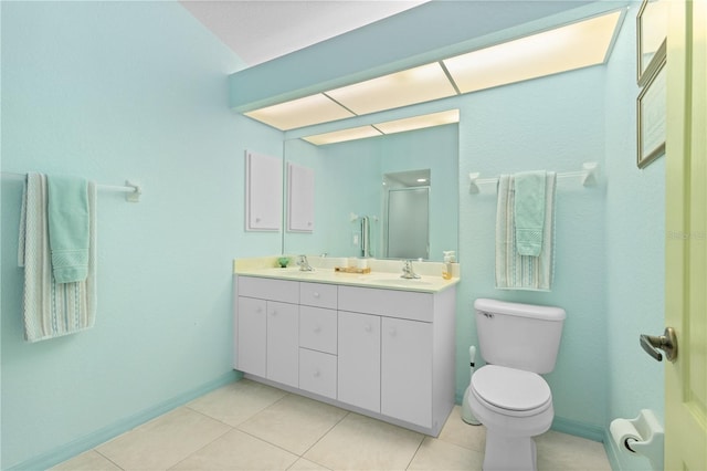 116 Tournament Rd, Rotonda West, FL 33947 - full bathroom featuring double vanity, toilet, tile patterned floors, a shower with door, and baseboards