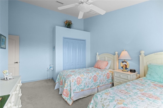 116 Tournament Rd, Rotonda West, FL 33947 - bedroom with light colored carpet, a closet, and ceiling fan