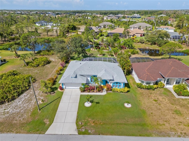 116 Tournament Rd, Rotonda West, FL 33947 - aerial view of residential area with a nearby body of water