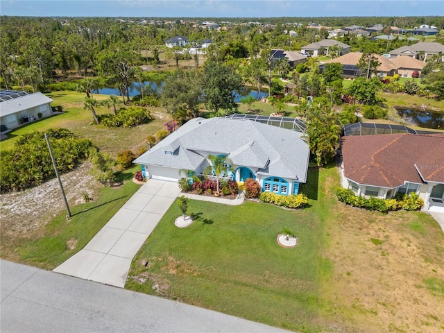 116 Tournament Rd, Rotonda West, FL 33947 - aerial perspective of suburban area featuring a large body of water
