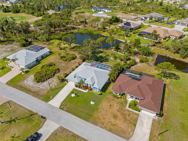 116 Tournament Rd, Rotonda West, FL 33947 - aerial perspective of suburban area with a large body of water