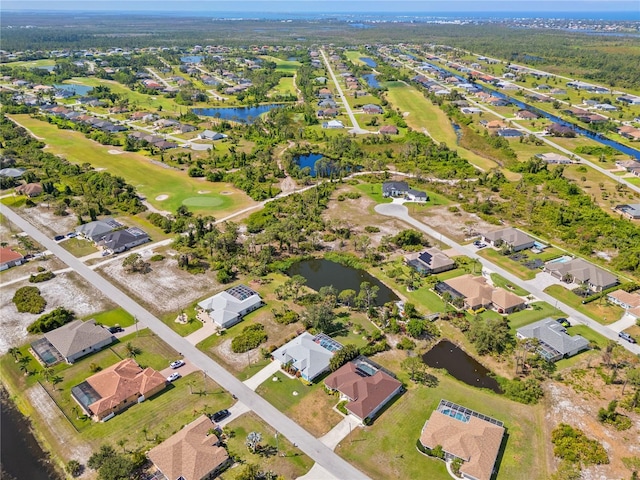 116 Tournament Rd, Rotonda West, FL 33947 - aerial overview of property's location with nearby suburban area, a large body of water, and a golf club
