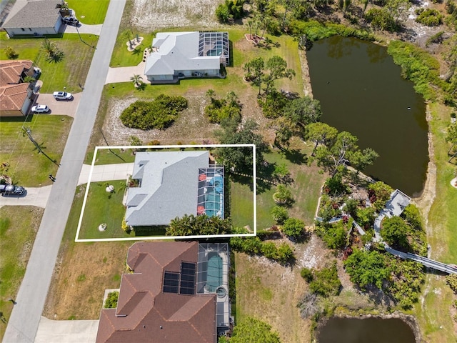 116 Tournament Rd, Rotonda West, FL 33947 - aerial view of property's location featuring a large body of water and property boundaries highlighted