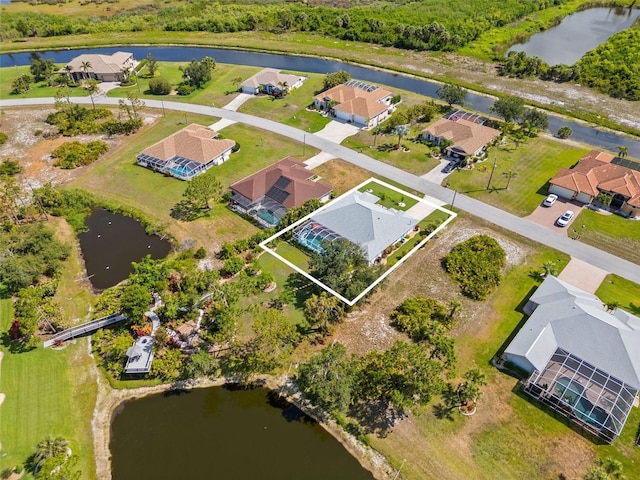 116 Tournament Rd, Rotonda West, FL 33947 - aerial perspective of suburban area featuring a nearby body of water