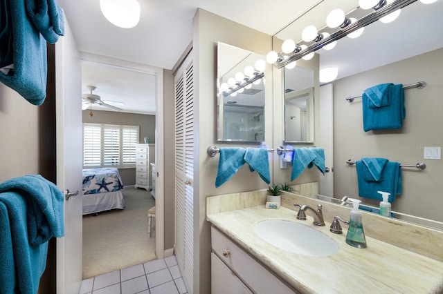 5700 Gulf Shores Dr Unit B-137, Boca Grande, FL 33921 - ensuite bathroom featuring vanity, tile patterned floors, a ceiling fan, and a closet