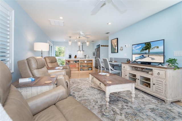 180 N Gulf Blvd Unit 5, Placida, FL 33946 - living room with a ceiling fan, light wood-style flooring, and recessed lighting