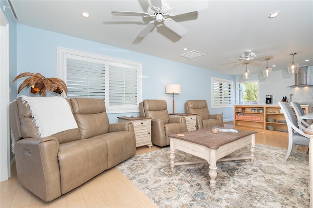 180 N Gulf Blvd Unit 5, Placida, FL 33946 - living room featuring ceiling fan, wood finished floors, and recessed lighting