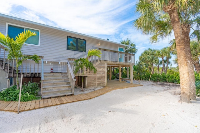 180 N Gulf Blvd Unit 5, Placida, FL 33946 - view of front of property featuring stairs and a wooden deck