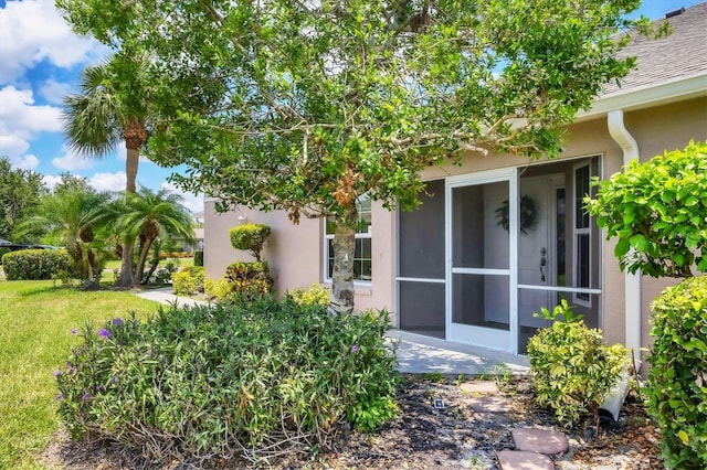 4225 Fairway Dr, North Port, FL 34287 - back of property featuring stucco siding