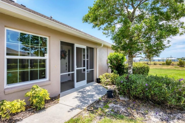 4225 Fairway Dr, North Port, FL 34287 - entrance to property featuring stucco siding