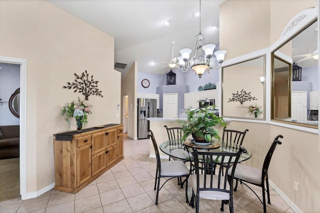 4225 Fairway Dr, North Port, FL 34287 - dining area featuring light tile patterned floors, a chandelier, high vaulted ceiling, a ceiling fan, and baseboards