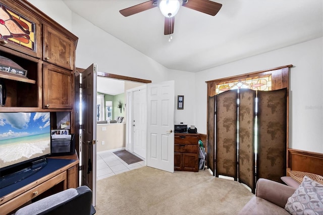 4225 Fairway Dr, North Port, FL 34287 - office area featuring lofted ceiling, a ceiling fan, light carpet, and light tile patterned floors