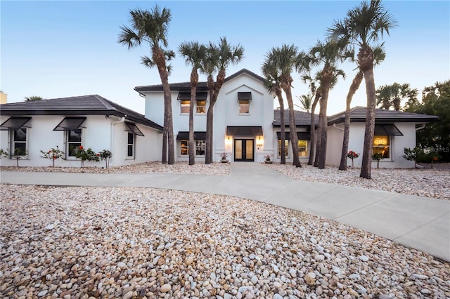 8500 Manasota Key Rd, Englewood, FL 34223 - view of front of home featuring french doors and stucco siding