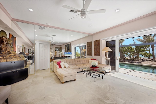 8500 Manasota Key Rd, Englewood, FL 34223 - living area featuring a ceiling fan, recessed lighting, ornamental molding, and light tile patterned floors