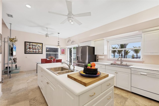 8500 Manasota Key Rd, Englewood, FL 34223 - kitchen with white dishwasher, a sink, stainless steel refrigerator with ice dispenser, a ceiling fan, and recessed lighting