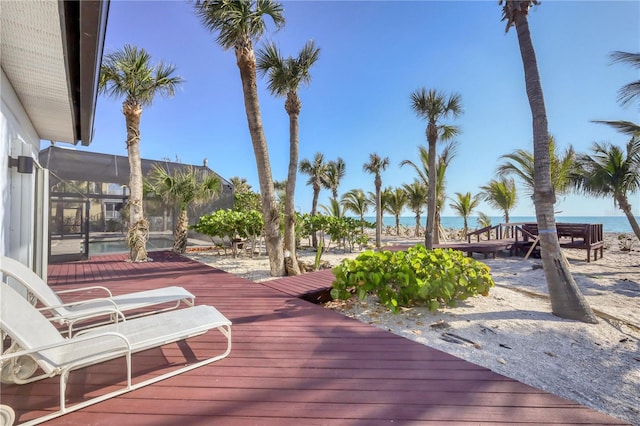 8500 Manasota Key Rd, Englewood, FL 34223 - wooden terrace featuring a water view and a lanai